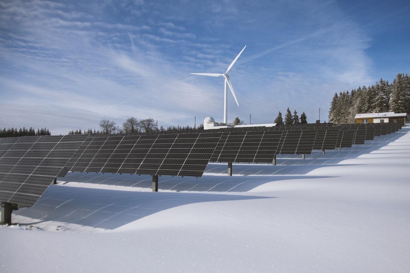 solar panels and wind turbine winter